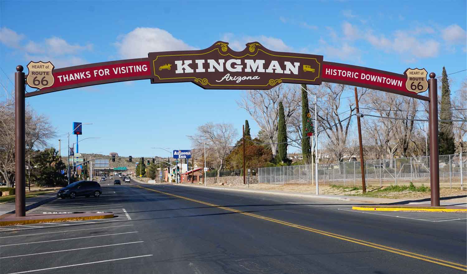 downtown kingman sign over road