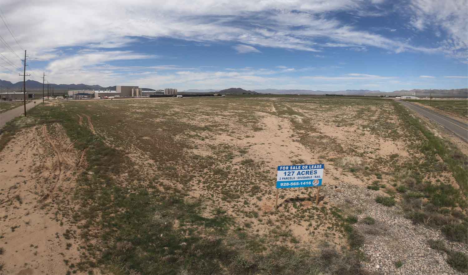 vacant land with for sale sign